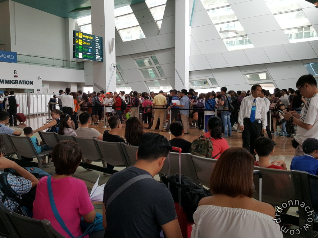 The long queue to boarding Royal Carribean
