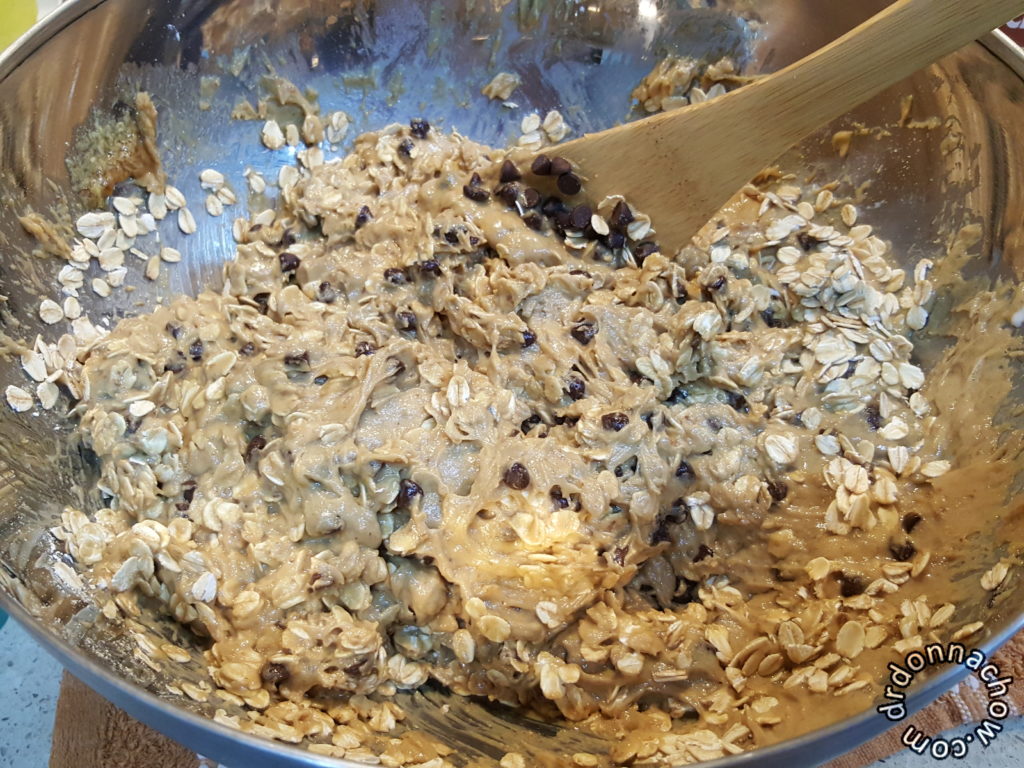 Mixing in the rolled oats and chocolate chips